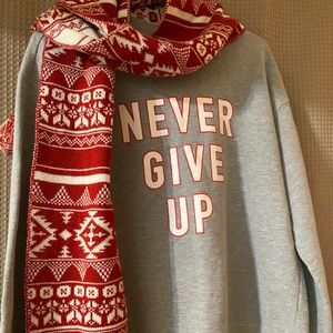Women’s sweater with a scarf added also